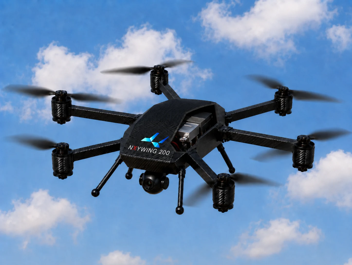 NXYWING 200 hexarotor in flight against blue sky